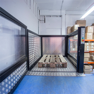 Low-rise platform goods lift for split-level storeroom Low-rise platform goods lift for split-level storeroom