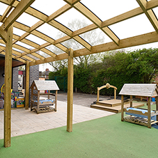 Timber play equipment and canopy for St Catherine's Timber play equipment and canopy for St Catherine's