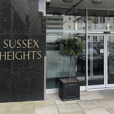 Automatic glass doors for iconic residential building Automatic glass doors for iconic residential building