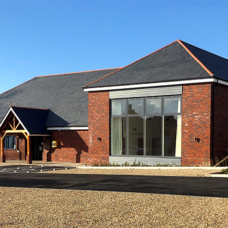Slate roofs show endurance at new village hall Slate roofs show endurance at new village hall