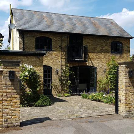 Coach house transformed into home with Clement steel doors and windows Coach house transformed into home with Clement steel doors and windows
