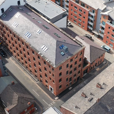 Natural and mechanical smoke ventilation within a Grade II listed former Printing Mill Natural and mechanical smoke ventilation within a Grade II listed former Printing Mill