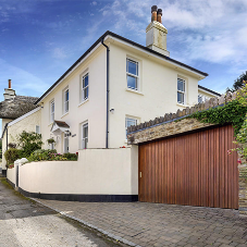 Why the door style will enhance or limit a garage’s functionality Why the door style will enhance or limit a garage’s functionality