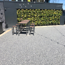 Resin bound paving is a popular option for outdoor surfaces Resin bound paving is a popular option for outdoor surfaces