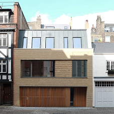 Hidden in plain sight – how to create seamlessly integrated garage doors Hidden in plain sight – how to create seamlessly integrated garage doors