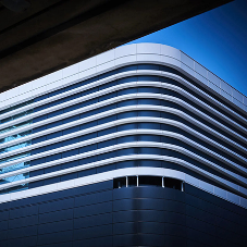 Multi-Storey Showroom and Workshop with RJ Facades' Aluminium Panel System and Vehicle Display Tower
