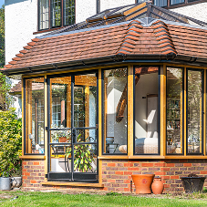Sensitive window and door replacement looks sensational filling this Arts and Craft home with natural light Sensitive window and door replacement looks sensational filling this Arts and Craft home with natural light
