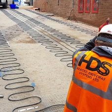 Two-lane heated ramp to underground parking at residential project