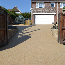 Transformation of a Tired Tarmac Driveway in Chapmanslade with SureSet Resin Bound Transformation of a Tired Tarmac Driveway in Chapmanslade with SureSet Resin Bound
