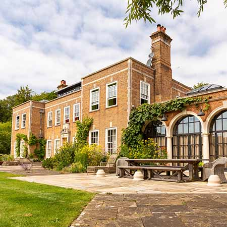 Arched head steel doors make a spectacular feature at this 20th Century Country House Arched head steel doors make a spectacular feature at this 20th Century Country House