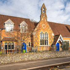 A combination of intricately shaped head windows manufactured by Clement for historic school A combination of intricately shaped head windows manufactured by Clement for historic school