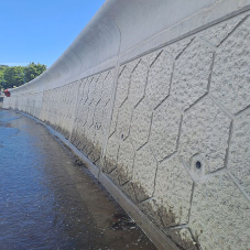 Scour resistant concrete for sea wall